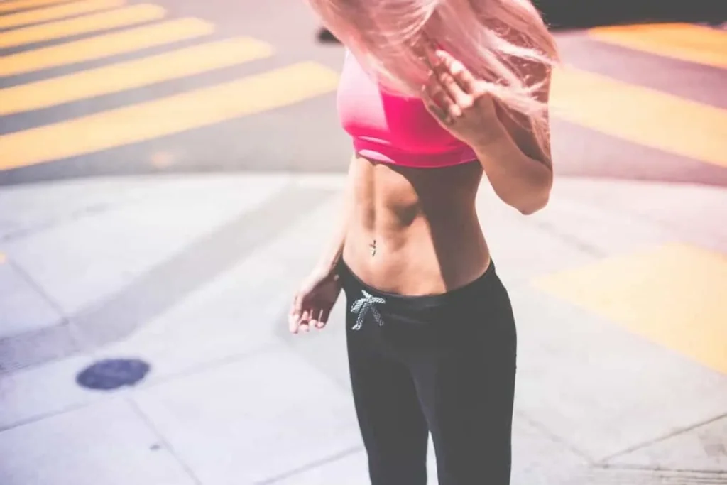 Woman with toned stomach after LA-EMS Body Sculpting Treatment Elstree Park
